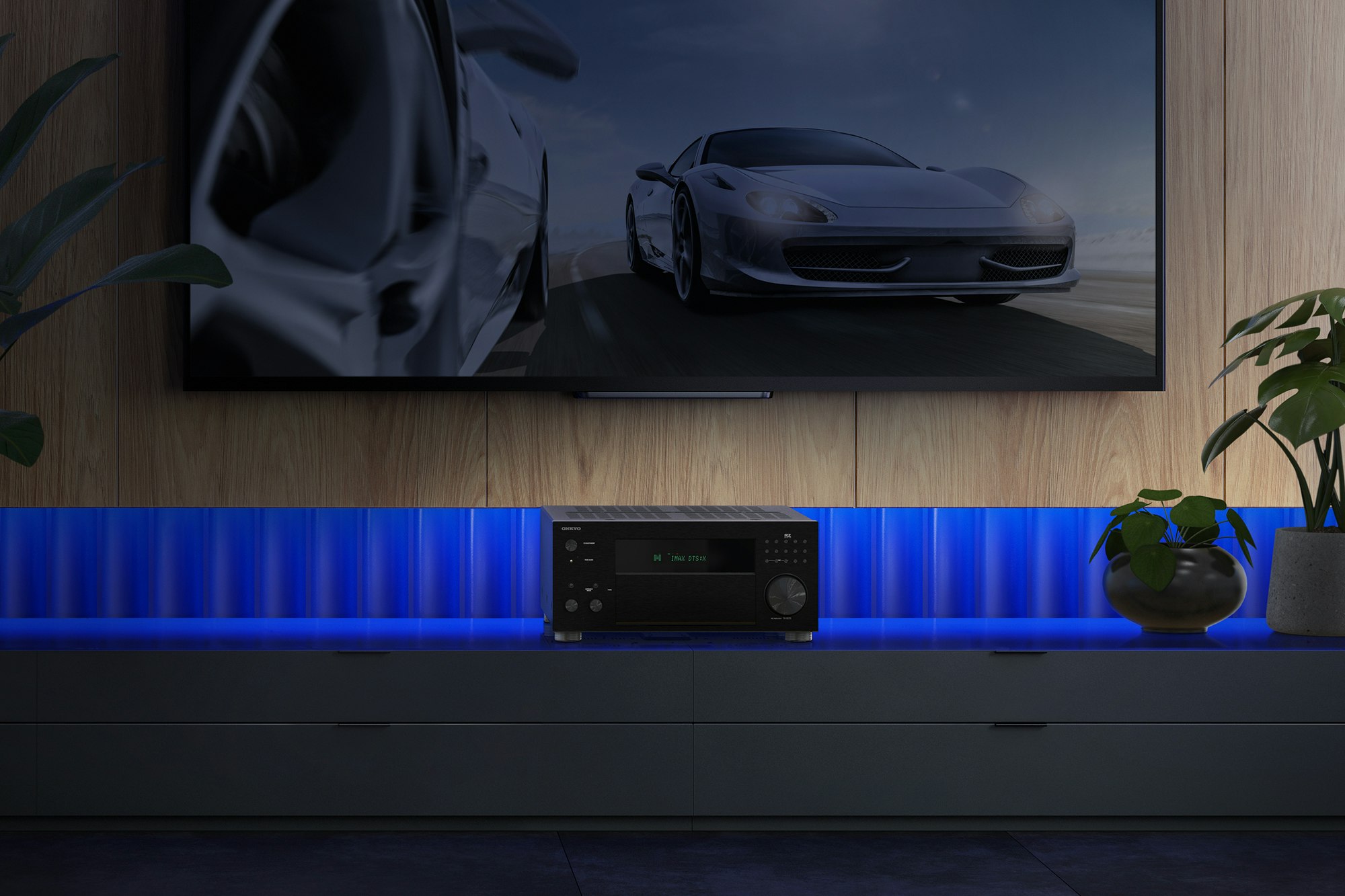 TX RZ70 On Media Console with Plants Blue Light Behind with Overlay 1920x1080